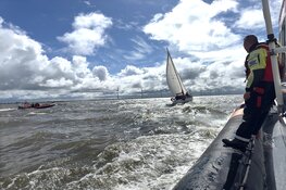 Tot de knieën in het water